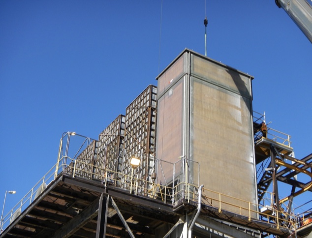 FRP equipment housing on steel structure against blue sky